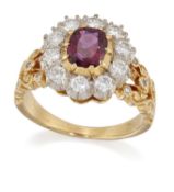 A RUBY AND DIAMOND CLUSTER RING