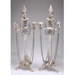 A PAIR OF 19TH CENTURY SILVER-PLATED CANDELABRA