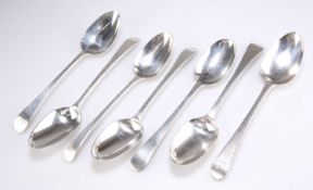 A GROUP OF SEVEN GEORGIAN BRIGHT-CUT SILVER TABLE SPOONS