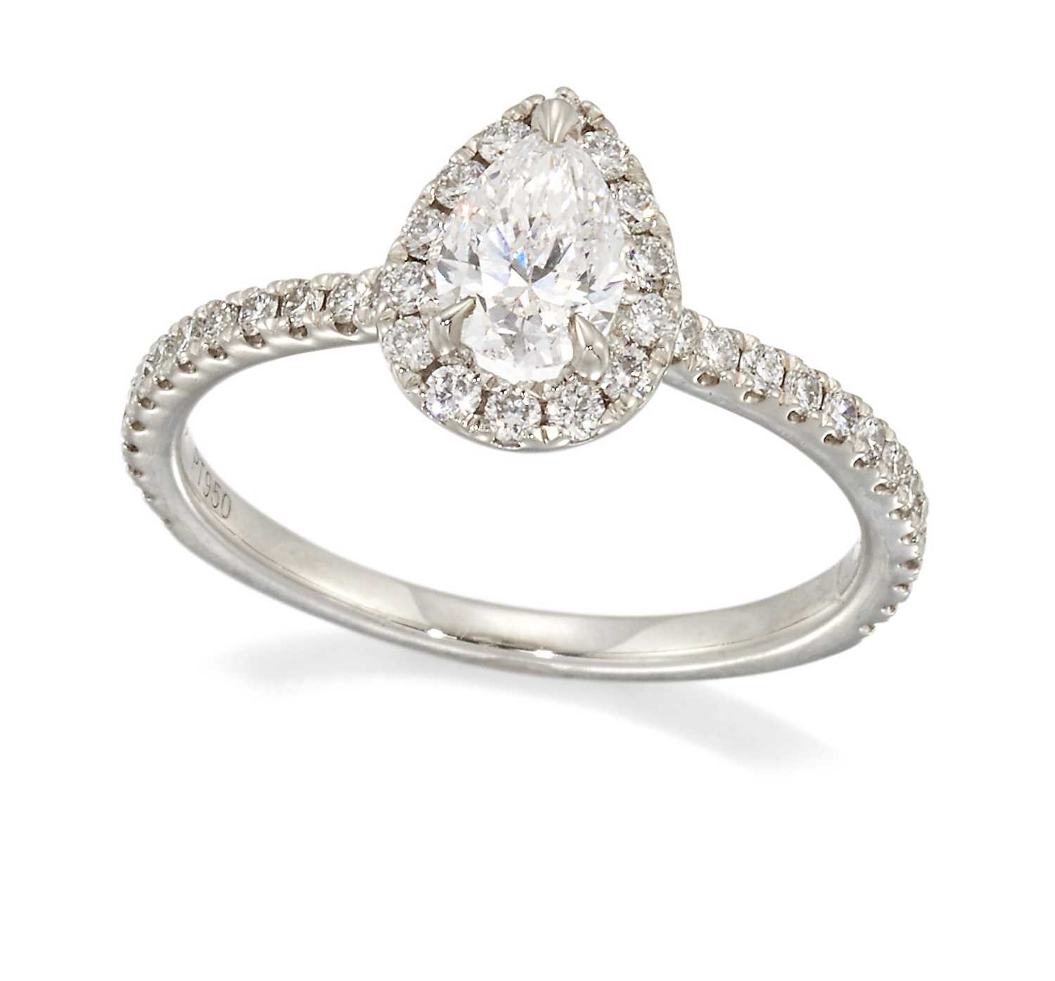 A PLATINUM PEAR-CUT DIAMOND CLUSTER RING