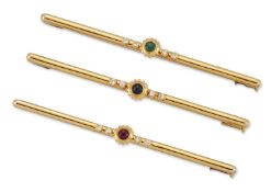 CARTIER - A SET OF THREE BROOCHES