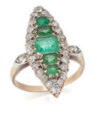 AN EMERALD AND DIAMOND CLUSTER NAVETTE RING