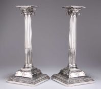 A PAIR OF GEORGE III SCOTTISH SILVER CANDLESTICKS