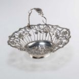 AN EARLY GEORGE III SILVER SWING-HANDLE SWEETMEATS BASKET