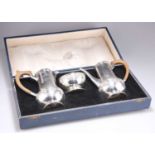 A GEORGE V SILVER THREE-PIECE BACHELOR'S COFFEE SERVICE