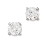 A PAIR OF 18 CARAT WHITE GOLD SOLITAIRE DIAMOND EARRINGS