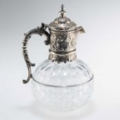 A VICTORIAN SILVER-MOUNTED CLARET JUG