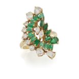 AN EMERALD AND DIAMOND DRESS RING