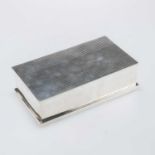 AN ART DECO SILVER CIGAR BOX