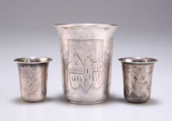 A RUSSIAN SILVER BEAKER AND A PAIR OF RUSSIAN SILVER TOTS