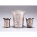 A RUSSIAN SILVER BEAKER AND A PAIR OF RUSSIAN SILVER TOTS