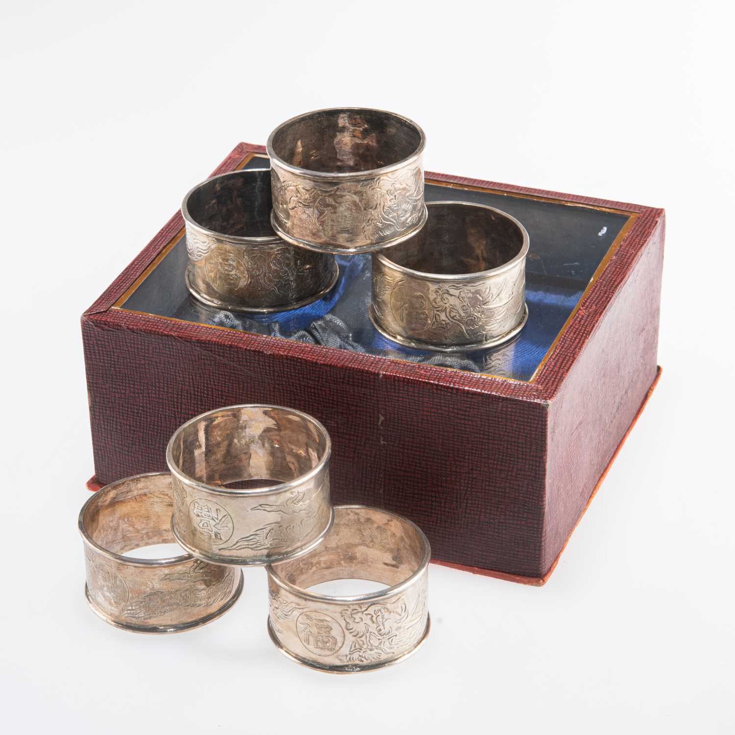 A SET OF SIX CHINESE EXPORT SILVER NAPKIN RINGS