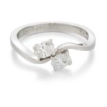 A PLATINUM OVAL-CUT DIAMOND TWO STONE CROSSOVER RING