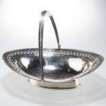 A GEORGE III SILVER CAKE BASKET