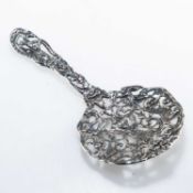 A LATE VICTORIAN SILVER SERVING SPOON