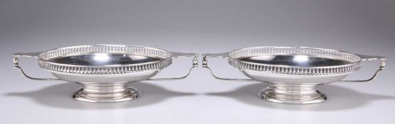 A PAIR OF GEORGE V SILVER TWO-HANDLED BON-BON DISHES