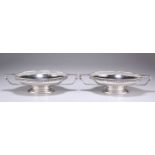 A PAIR OF GEORGE V SILVER TWO-HANDLED BON-BON DISHES