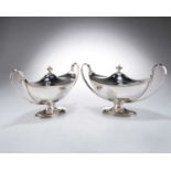 A PAIR OF GEORGE III SILVER SAUCE TUREENS