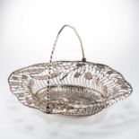 AN EARLY GEORGE III SILVER CAKE BASKET