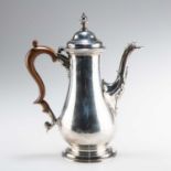 AN EARLY GEORGE III SILVER COFFEE POT