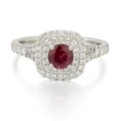 A PLATINUM RUBY AND DIAMOND CLUSTER RING