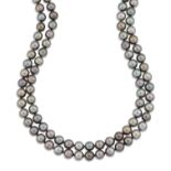 A LONG SINGLE STRAND TAHITIAN CULTURED PEARL NECKLACE