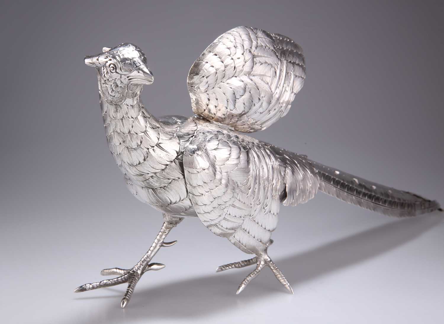 A LARGE GERMAN SILVER PHEASANT TABLE ORNAMENT