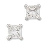 A PAIR OF 18 CARAT WHITE GOLD SOLITAIRE PRINCESS-CUT DIAMOND EARRINGS