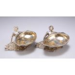 ROYAL INTEREST: A RARE PAIR OF VICTORIAN CAST SILVER-GILT SALTS