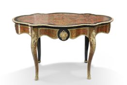 A LOUIS XV-STYLE GILT-METAL MOUNTED BOULLE BUREAU PLAT