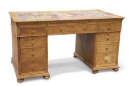 A LATE 19TH CENTURY OAK DESK