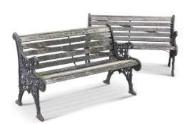 A PAIR OF CAST IRON BENCHES