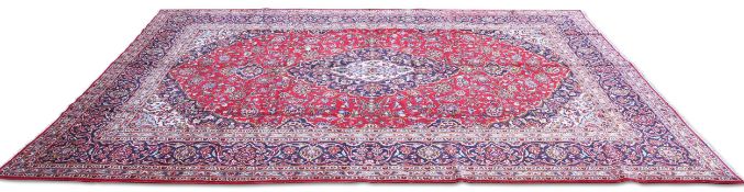 A PERSIAN KASHAN CARPET