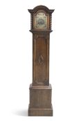 AN EARLY 20TH CENTURY OAK THREE-TRAIN GRANDMOTHER CLOCK