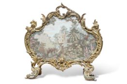 A 19TH CENTURY ROCOCO-STYLE GILT-METAL FIRESCREEN