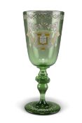 AN ARMORIAL GREEN GLASS GOBLET, CIRCA 1890