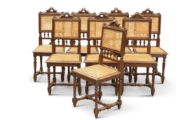 A SET OF EIGHT CONTINENTAL OAK AND CANEWORK DINING CHAIRS, LATE 19TH CENTURY