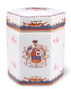 AN ARMORIAL TEA CADDY AND COVER