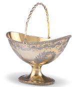 A VICTORIAN SILVER-GILT SUGAR BASKET