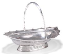 A GEORGE III SILVER CAKE BASKET