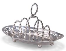 AN EDWARDIAN SILVER TOAST RACK