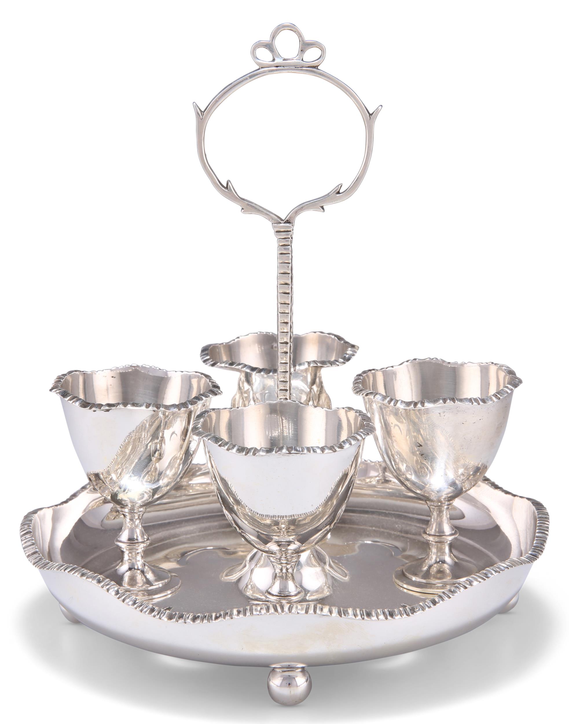 AN EDWARDIAN SILVER EGG CRUET