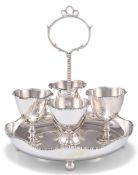 AN EDWARDIAN SILVER EGG CRUET