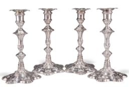 A FINE SET OF FOUR GEORGE II SILVER CANDLESTICKS