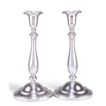 A PAIR OF GEORGE III SILVER CANDLESTICKS