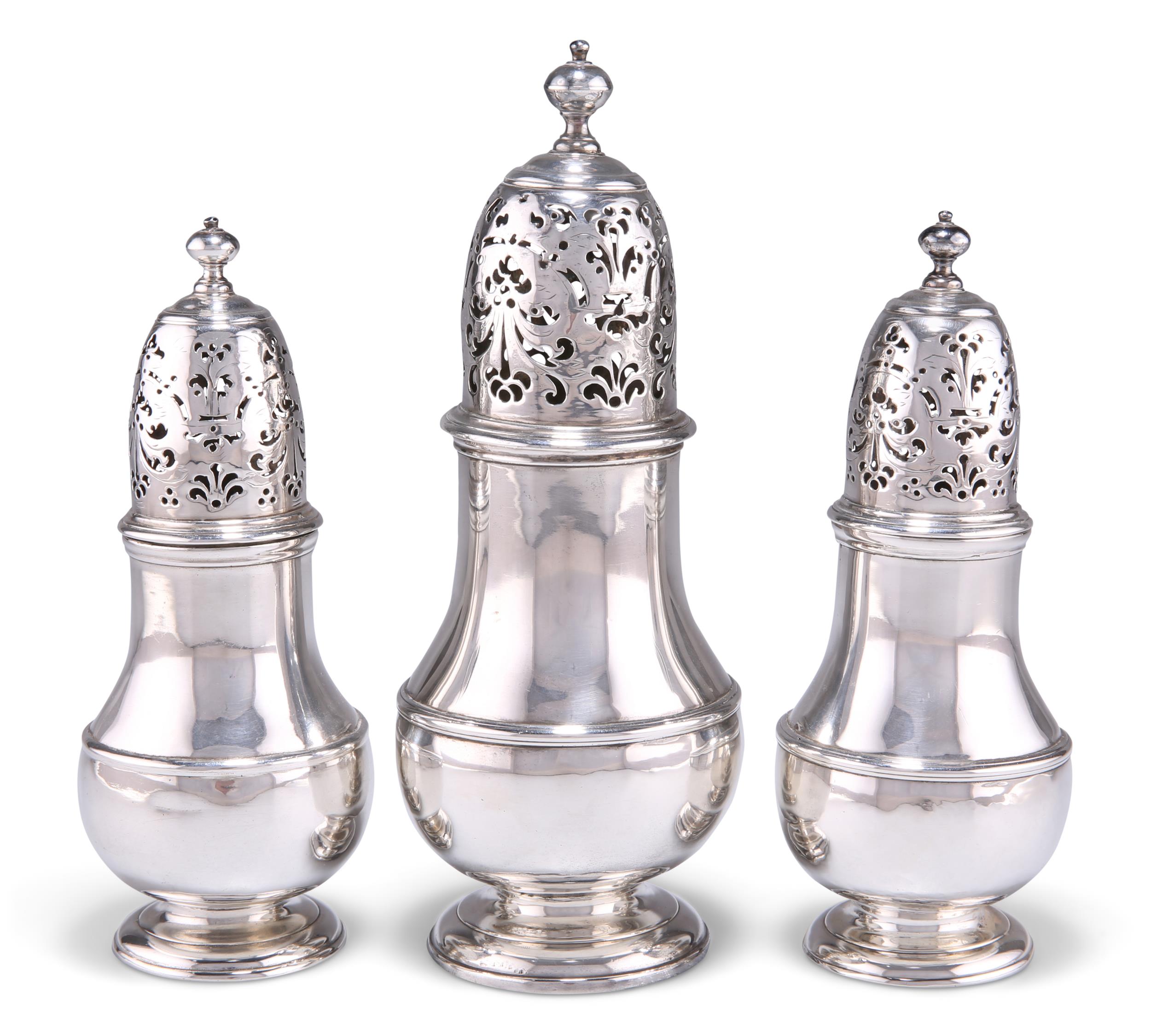 A SET OF THREE GEORGE I SILVER CASTERS