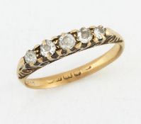 AN 18 CARAT GOLD DIAMOND RING