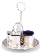 AN IRAQI SILVER AND NIELLO CRUET SET ON STAND