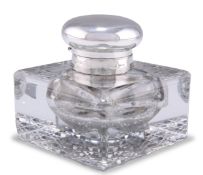 AN EDWARDIAN SILVER-TOPPED CUT-GLASS INKWELL