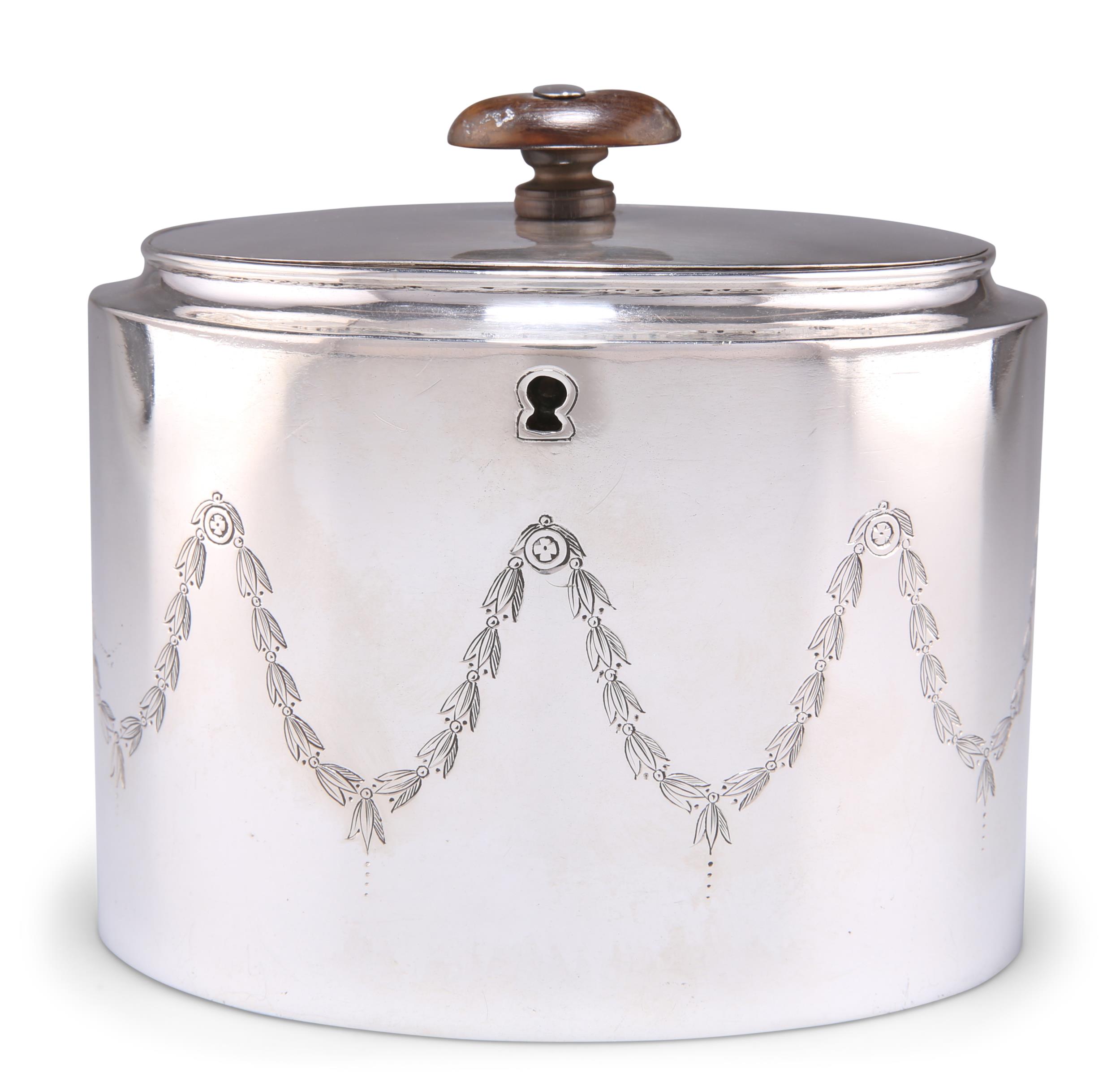 A GEORGE III SILVER TEA CADDY